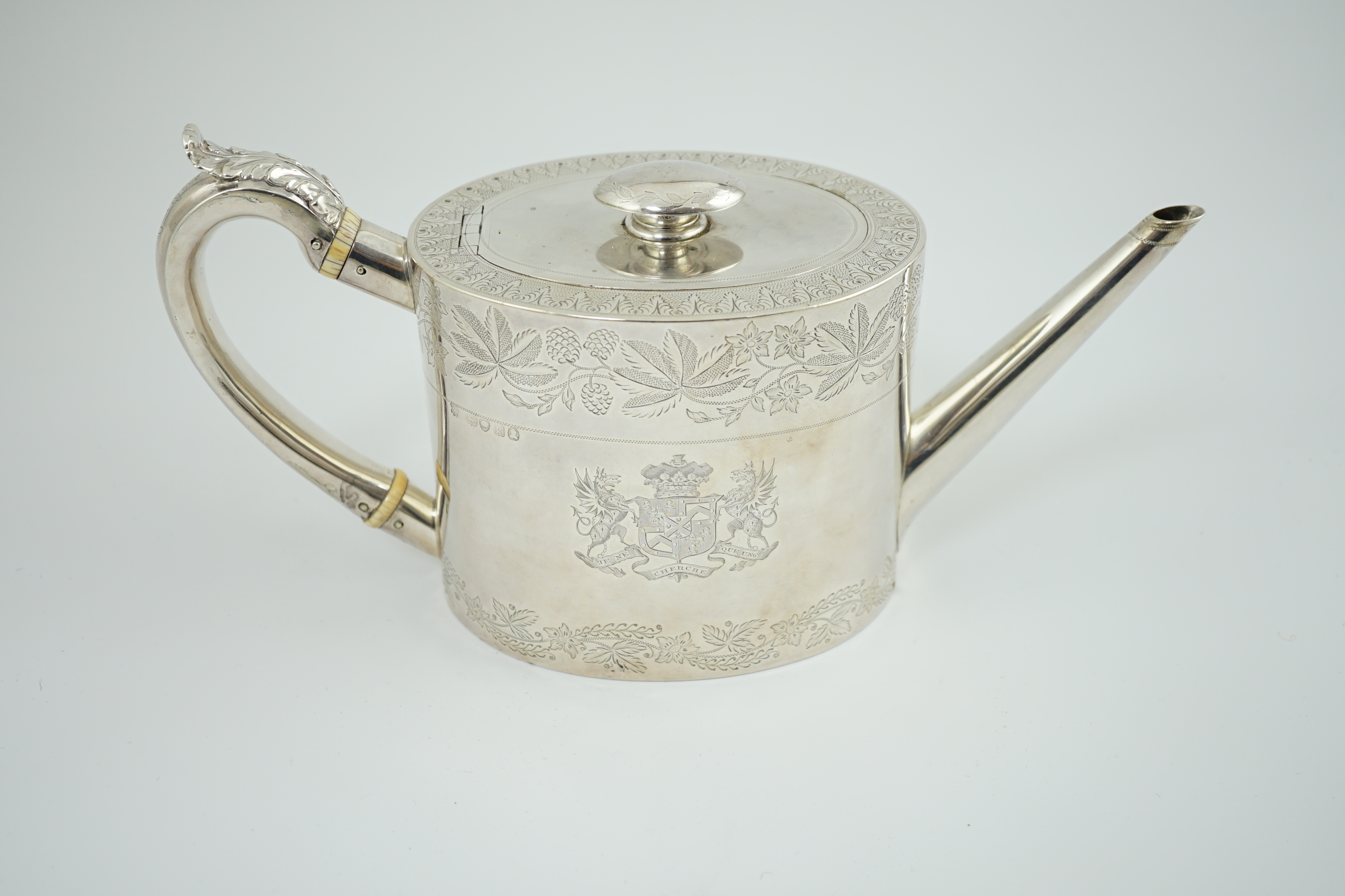 A George IV silver oval teapot by Eames & Barnard, engraved with Coat of Arms of the Duke of Bedford and Earl Compton